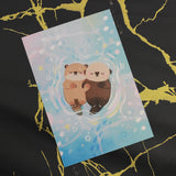 PANDA YOONG Otters Holding Hand Postcard