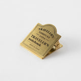 TRC Brass Clip Traveler's Logo