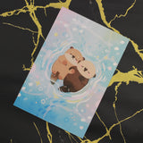 PANDA YOONG Otters Holding Hand Postcard