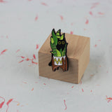 SUPA LUNA Enamel Pin Cat hiding behind monstera