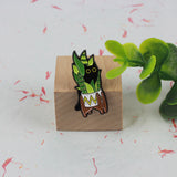 SUPA LUNA Enamel Pin Cat hiding behind monstera