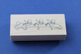 MICIA Wooden Rubber Stamp Sitting On Banana Boat