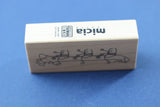 MICIA Wooden Rubber Stamp Sitting On Banana Boat